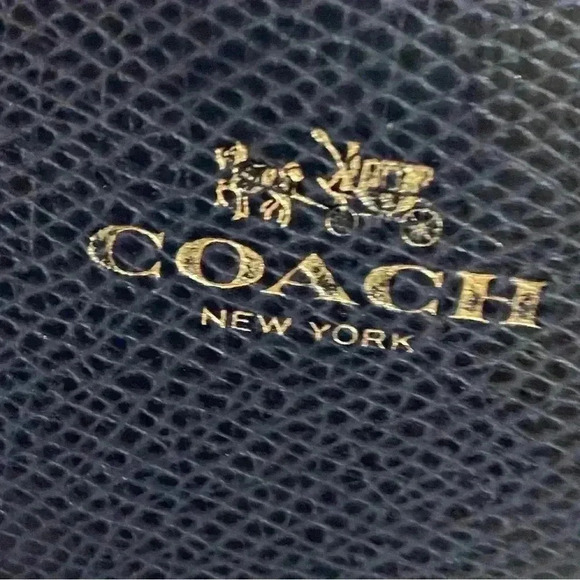 Coach navy blue leather wristlet